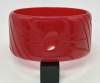 vintage wide red slash carved bakelite bangle
